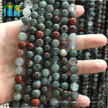 Piedras preciosas al por mayor 6 mm piedras preciosas sueltas redondas perlas de piedra semipreciosa de alta calidad Caras lisas ágata sangre de África para la joyería